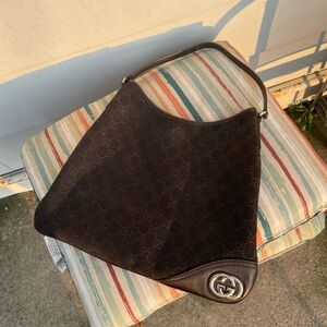 Gucci Britt Hobo black canvas GG medium very good condition. Have dust bag.